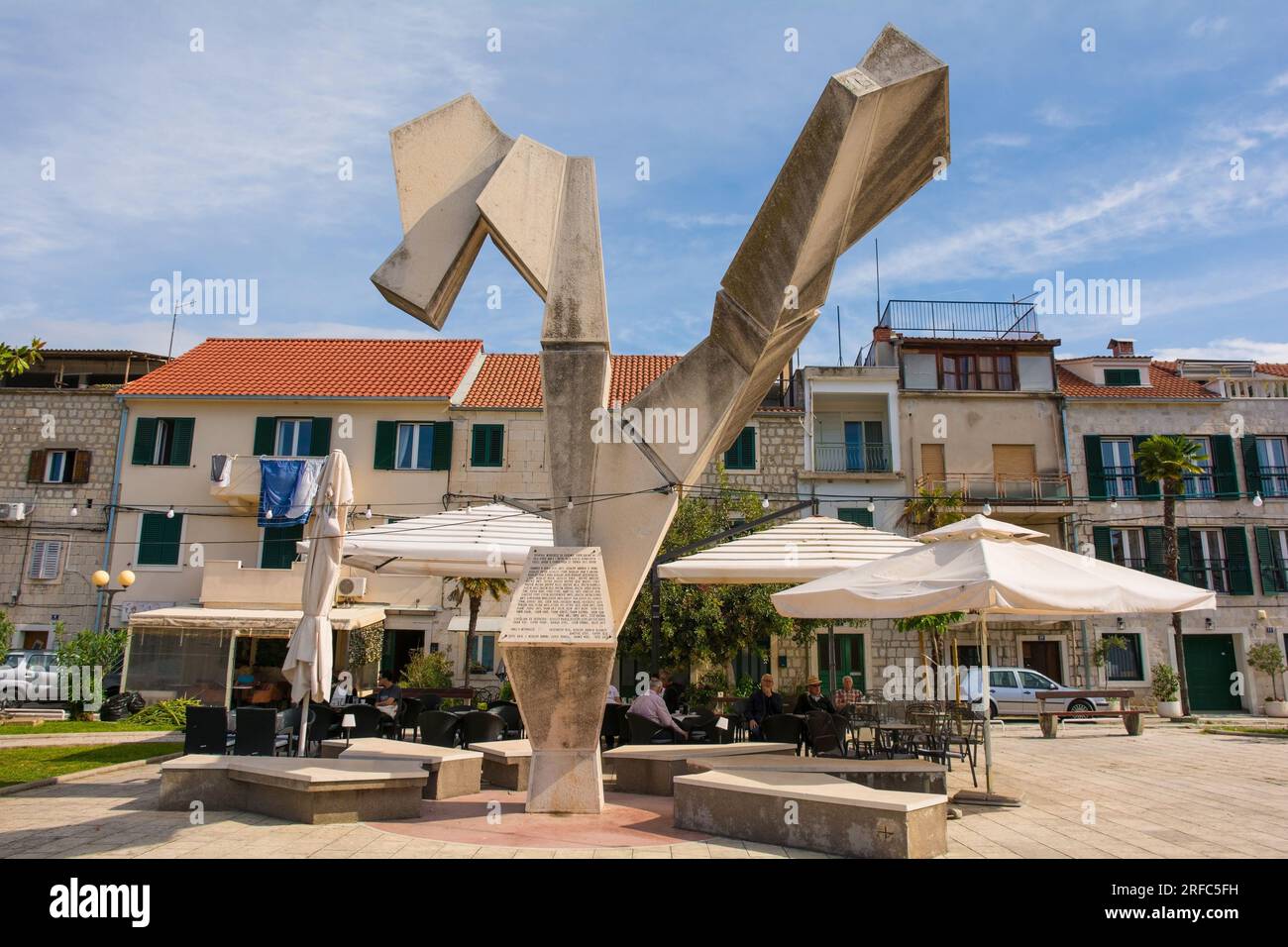 Kastela, Croatia - May 19 2023. A Yugoslav era 2nd world war memorial in Kastel Kambelovac, Kastela. Entitled Monument to the Revolution Stock Photo