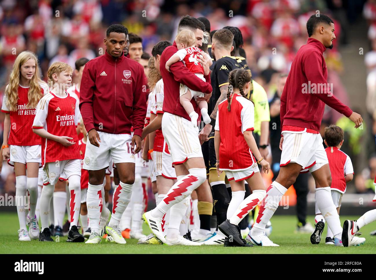 Arsenal's Declan Rice with his son (centre) before the pre-season ...