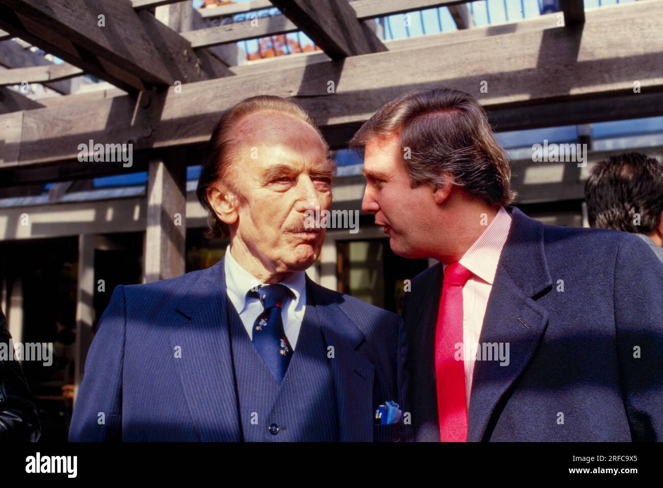 Fred Trump and son, Donald Trump 1980. Starting in 1968, Trump was employed at his father Fred's real-estate company, Trump Management, which owned middle-class rental housing in New York City's outer boroughs. Photo by Bernard Gotfryd Stock Photo