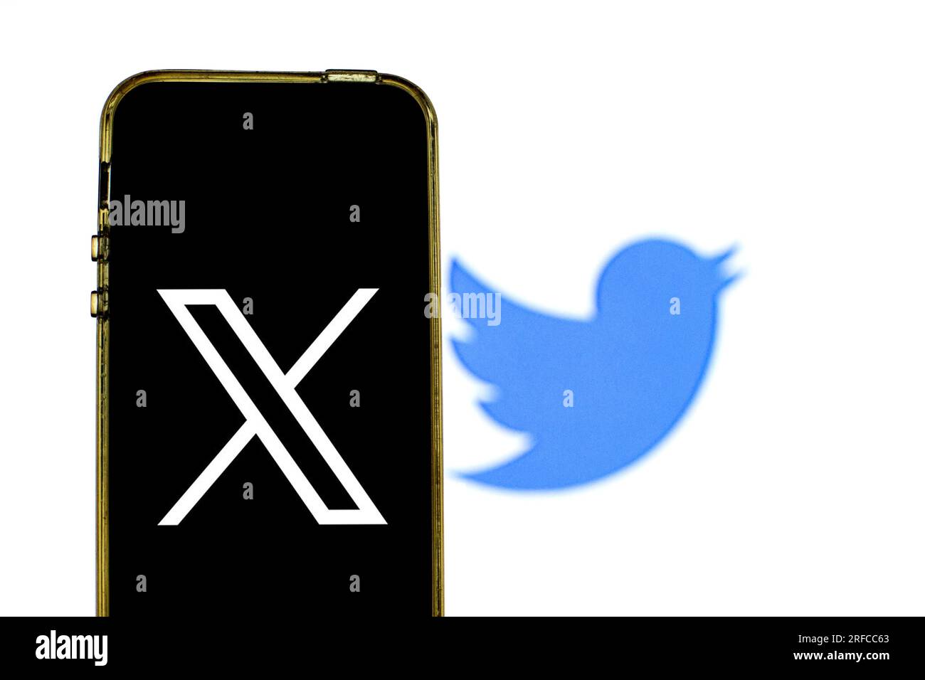 Spain. 8th June, 2021. In this photo illustration a new Twitter logo is seen displayed on a smartphone with the old Twitter logo in the background. (Credit Image: © Thiago Prudencio/SOPA Images via ZUMA Press Wire) EDITORIAL USAGE ONLY! Not for Commercial USAGE! Stock Photo