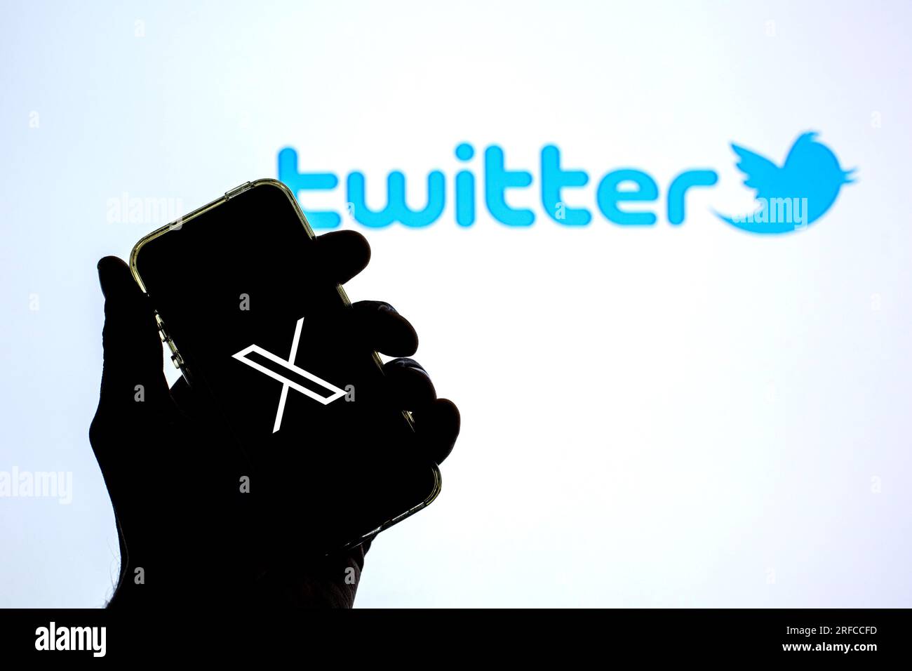 Spain. 13th Apr, 2021. In this photo illustration a new Twitter logo is seen displayed on a smartphone with the old Twitter logo in the background. (Credit Image: © Thiago Prudencio/SOPA Images via ZUMA Press Wire) EDITORIAL USAGE ONLY! Not for Commercial USAGE! Stock Photo