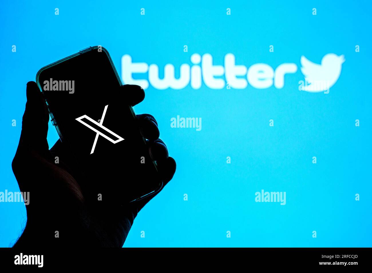 Spain. 13th Apr, 2021. In this photo illustration a new Twitter logo is seen displayed on a smartphone with the old Twitter logo in the background. (Credit Image: © Thiago Prudencio/SOPA Images via ZUMA Press Wire) EDITORIAL USAGE ONLY! Not for Commercial USAGE! Stock Photo