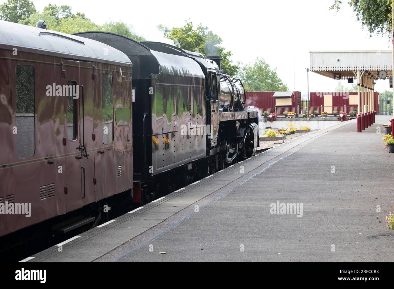 Preserved British Rail steam locomotive 73126 Class 5 MT waiting at the station platform at Leicester North prior to departure to Loughborough Stock Photo