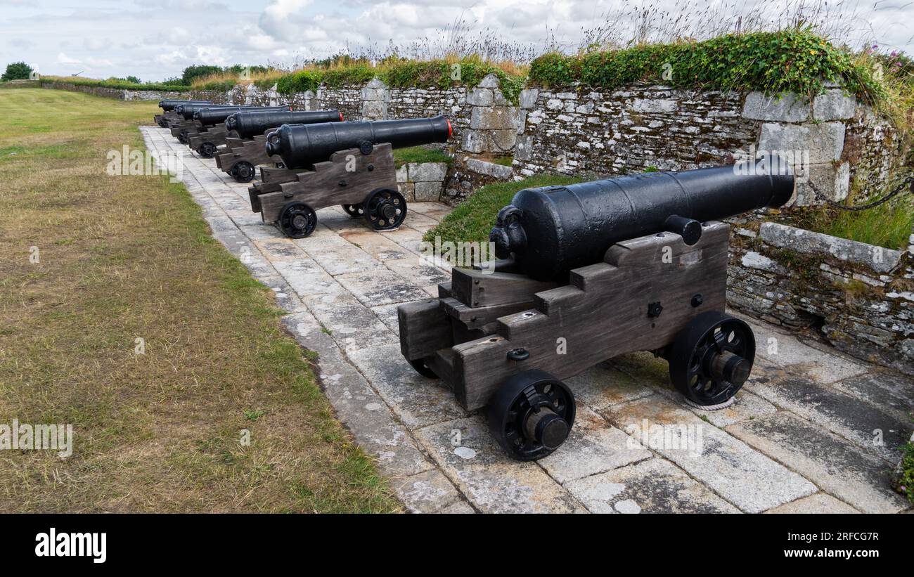 PENDENNIS CASTLE, FALMOUTH, CORNWALL, UK - JULY 5, 2023.  Medieval ship cannons on battlements at Pendennis castle in Falmouth, Cornwall. Stock Photo