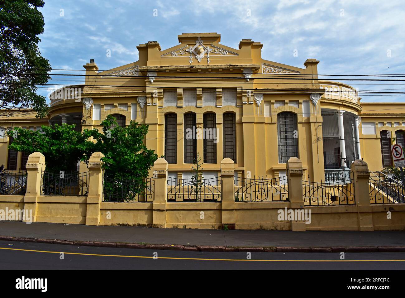 Ancient yellow house facade in Ribeirao Preto, Sao Paulo, Brazil Stock Photo