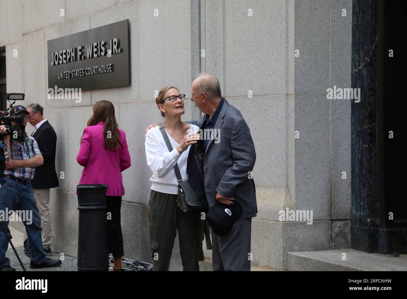 Jayson Clickner Jean Clickner hugs another man following the sentencing of Robert ...