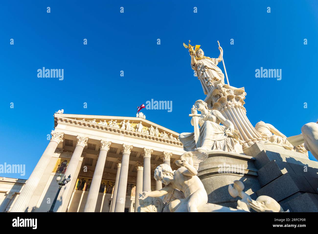 Vienna: Austrian Parliament Building, fountain Pallas-Athena-Brunnen in 01. Old Town, Wien, Austria Stock Photo