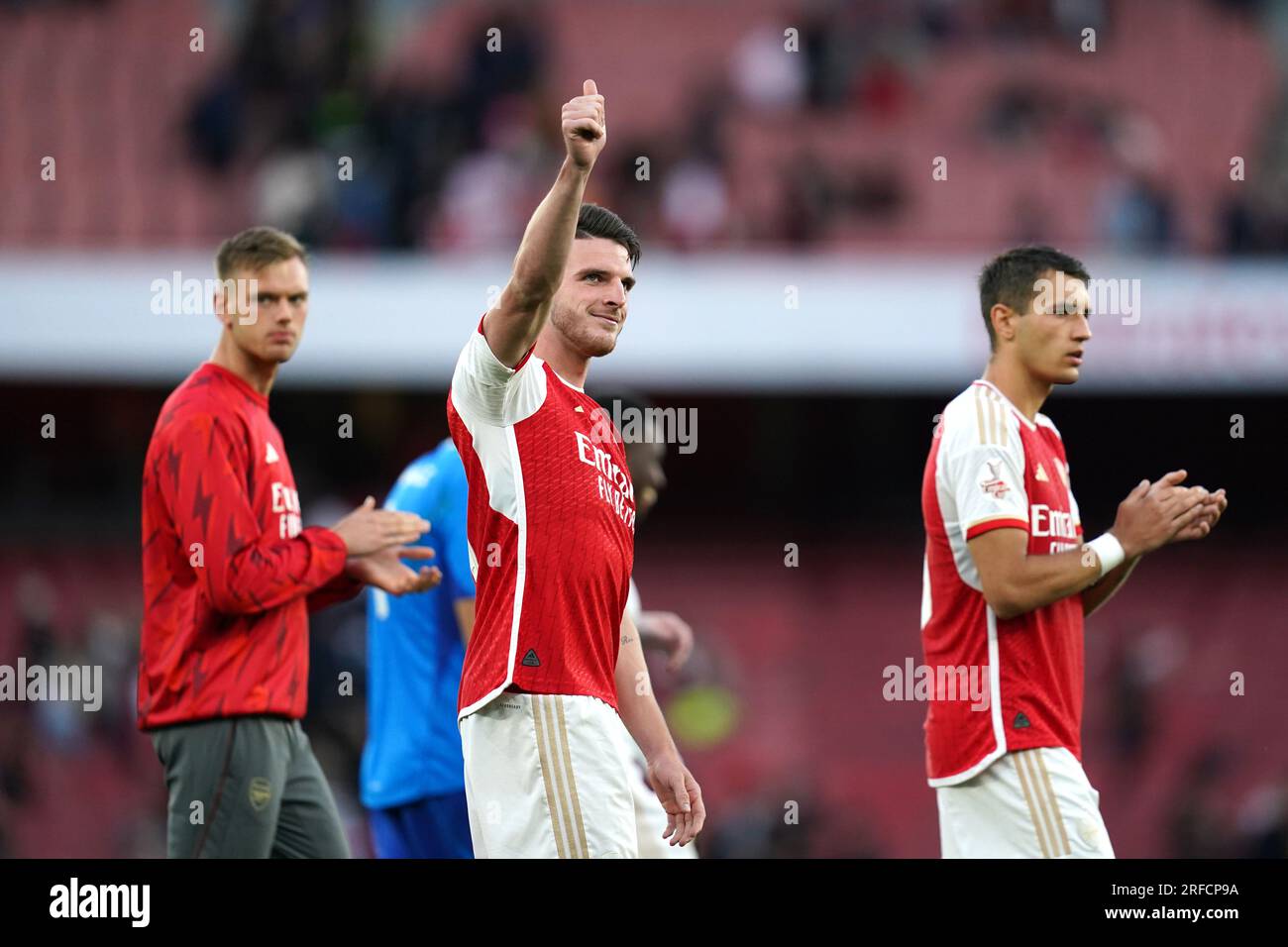 Arsenal's Declan Rice (centre) salutes the fans following the pre ...