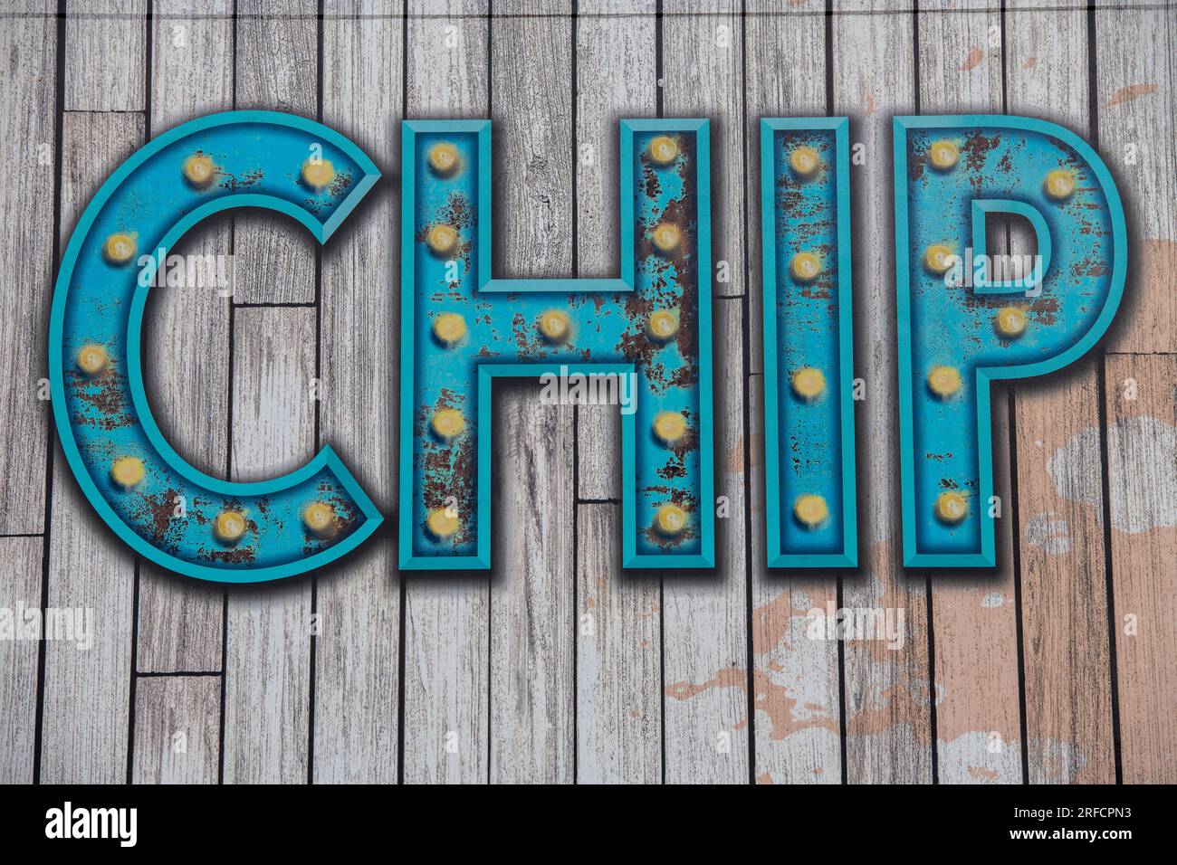 the word chip written in raised and illuminated letters against a plain wooden planked background. Stock Photo