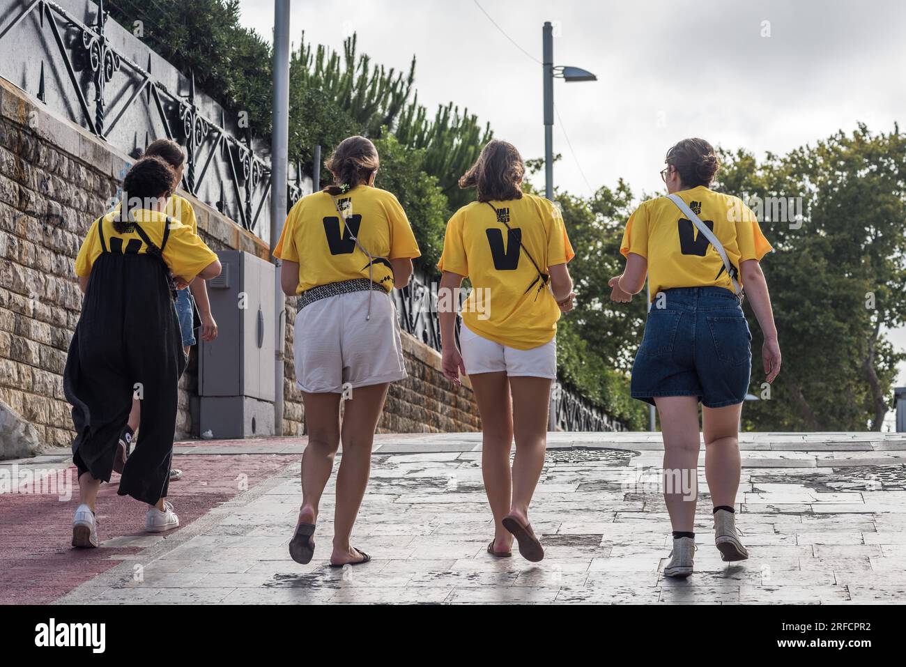 Cascais, Portugal - August 2, 2023: Catholic youngsters from multiple nationalities in Cascais for the World Youth Day 2023, a Catholic festival held in Lisbon, Portugal between August 1st and 6th 2023, the pope will visit Cascais on August 3rd Stock Photo