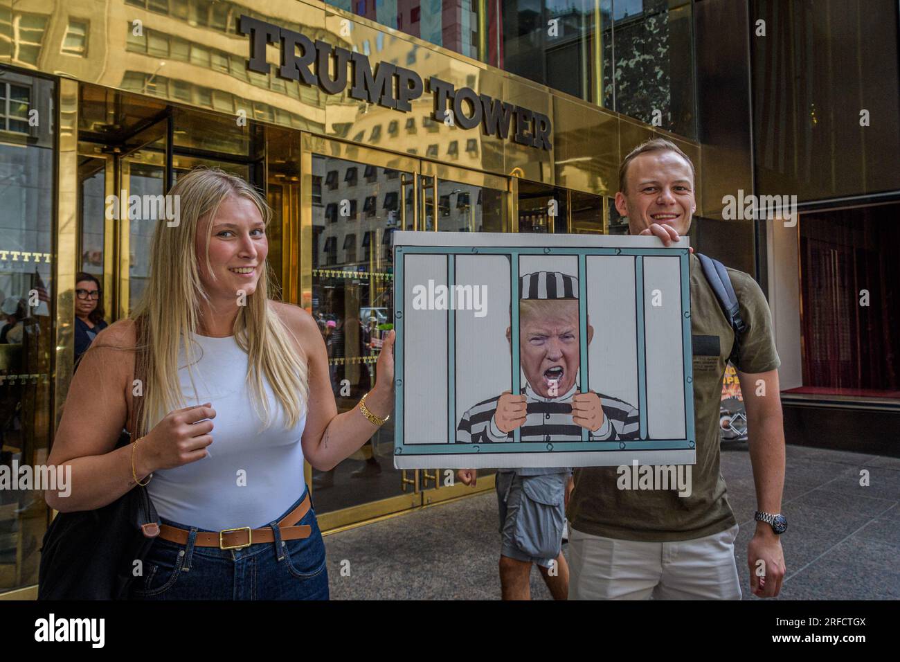 In the wake of the latest Special Counsel Jack Smith's indictement of Donald Trump, members of the activist group Rise and Resist and allies gathered outside Trump Tower in Manhattan on August 2, 2023 demanding state governments to disqualify former President Trump from appearing on ballots in 2024 under the 14th Amendment. The group stated that secretaries of state are empowered by the 14th Amendment to bar Trump from running for office because of his incitement of the January 6, 2021 Capitol insurrection. (Photo by Erik McGregor/Sipa USA) Stock Photo