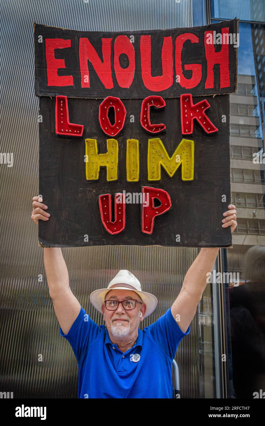 In the wake of the latest Special Counsel Jack Smith's indictement of Donald Trump, members of the activist group Rise and Resist and allies gathered outside Trump Tower in Manhattan on August 2, 2023 demanding state governments to disqualify former President Trump from appearing on ballots in 2024 under the 14th Amendment. The group stated that secretaries of state are empowered by the 14th Amendment to bar Trump from running for office because of his incitement of the January 6, 2021 Capitol insurrection. (Photo by Erik McGregor/Sipa USA) Stock Photo