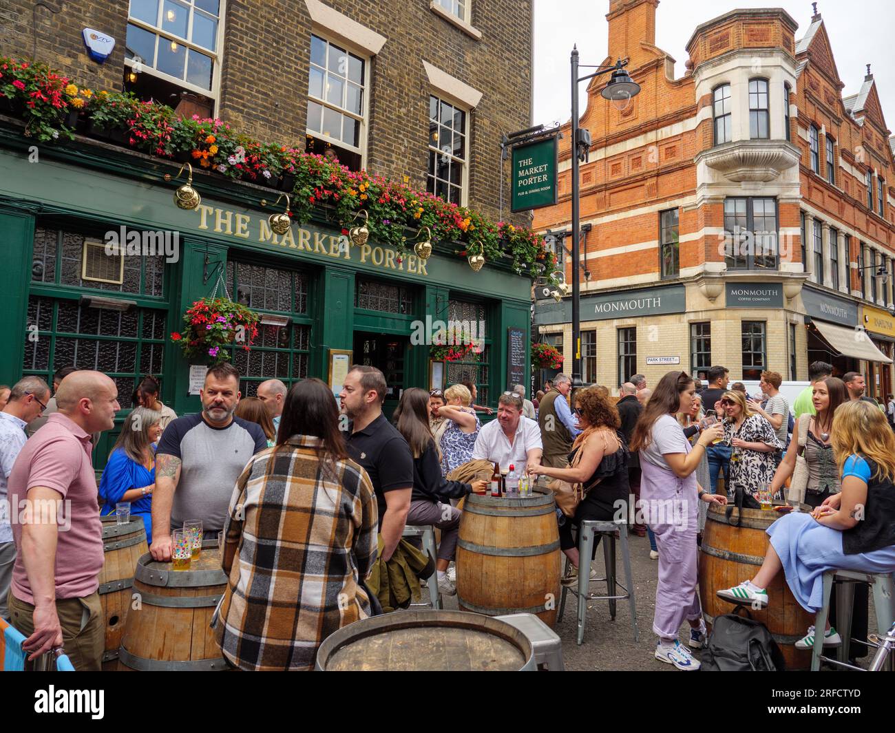 People drinking outside the The Market Porter pub beside Borough Market, London, UK Stock Photo