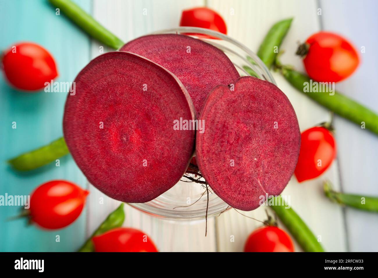 sliced beetroot on wood background Stock Photo
