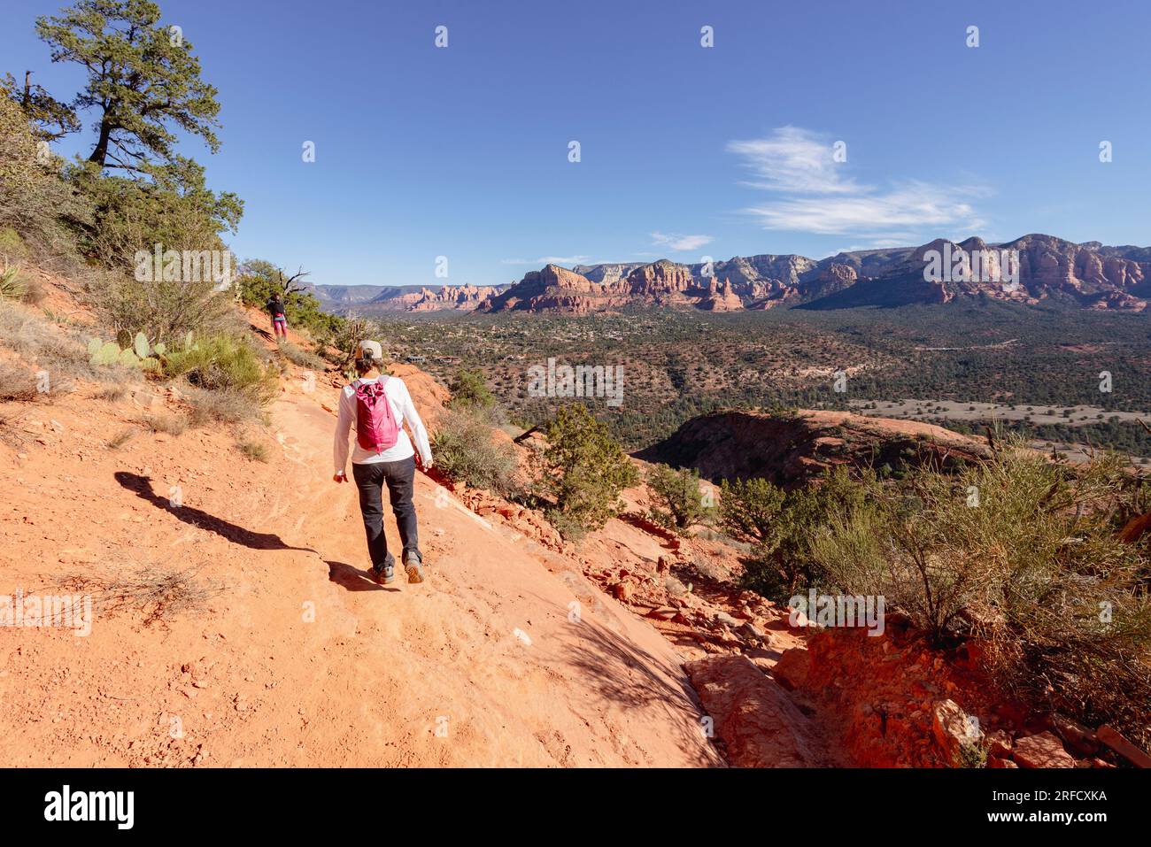 People enjoy a walk on the hiking trails in Red Rock state park in Arizona USA Stock Photo