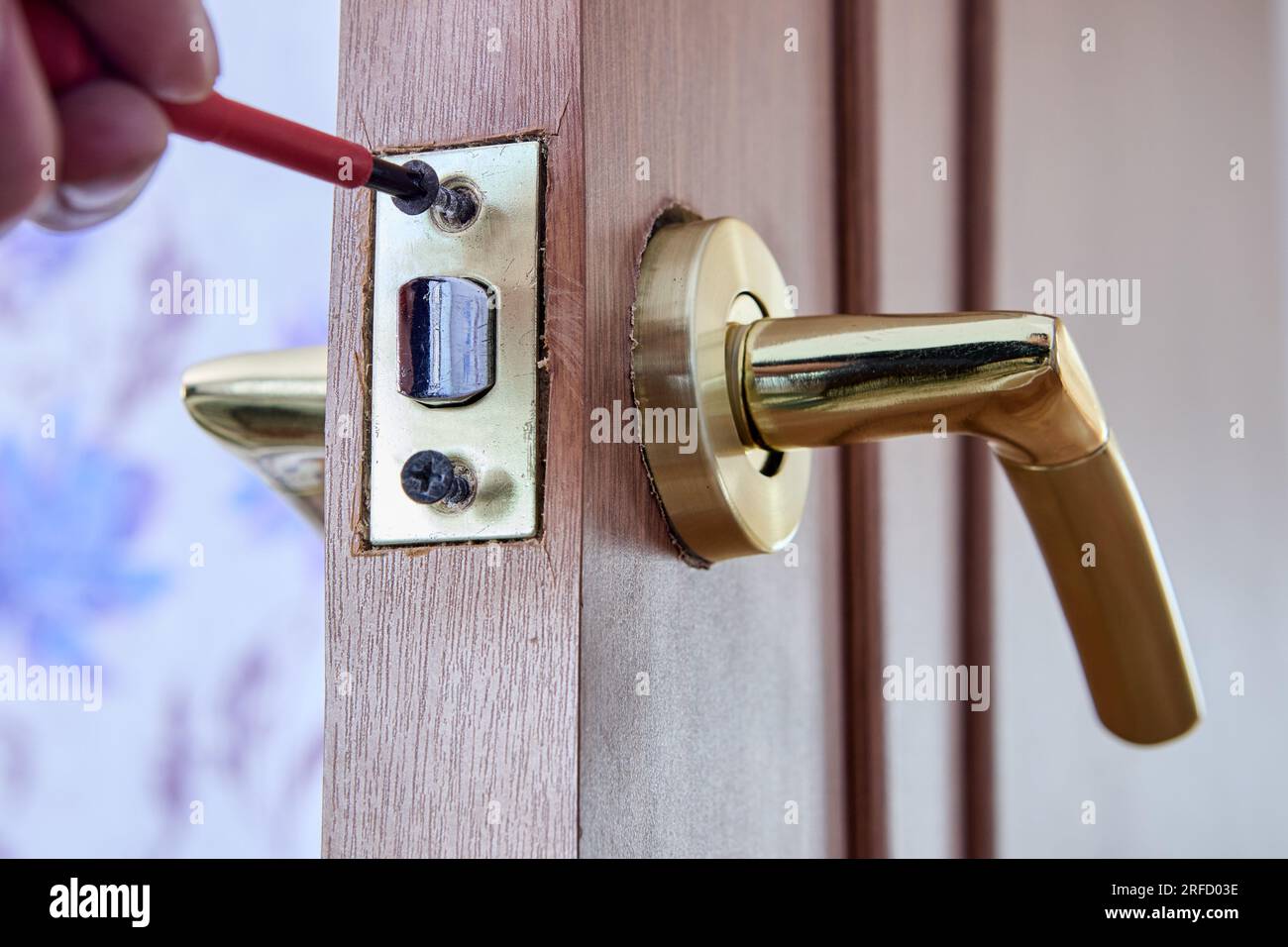 Assembly of rotary mechanism of lever door handle with latch Stock