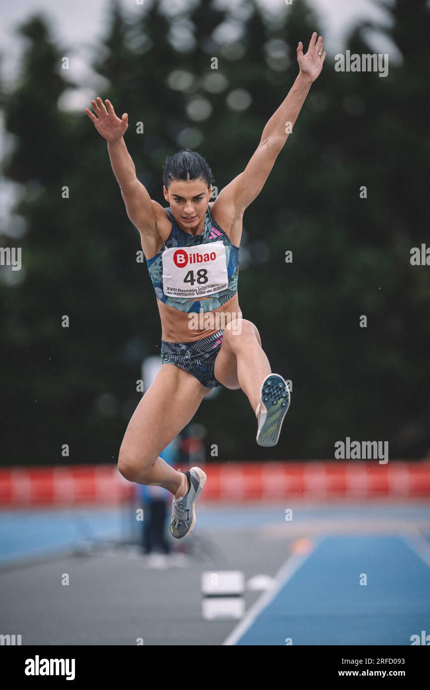 Dovilė Kilty jumping at the Bilbao International Meeting in Spain in 2023  with his Adidas brand Stock Photo - Alamy