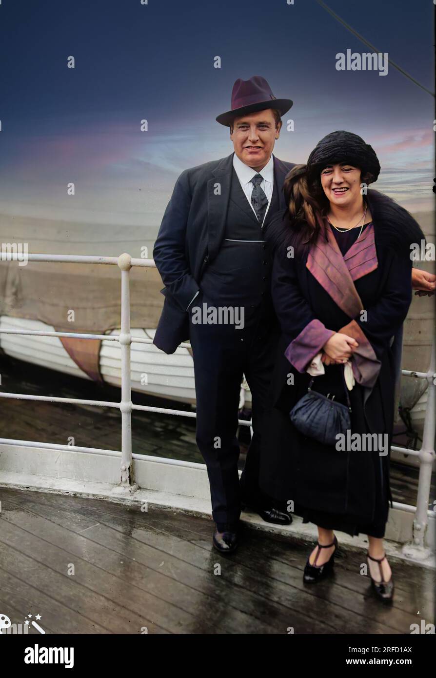 This colourised photograph shows Irish American tenor singer John McCormack (1884-1945) with his wife, singer Liley Foley on a ship. It was taken between 1920 and 1925. The original black and white photo is available in the Library of Congress. She met her husband while both were members of Berkley Road Catholic Church in Dublin. In her youth she had been a noted soprano. They married in 1906 when she was 19 and he was 21. She has written a memoir of their life together ‘I Hear You Calling Me’ the title of a song her husband often sang. She died in Dublin in 1971. Stock Photo