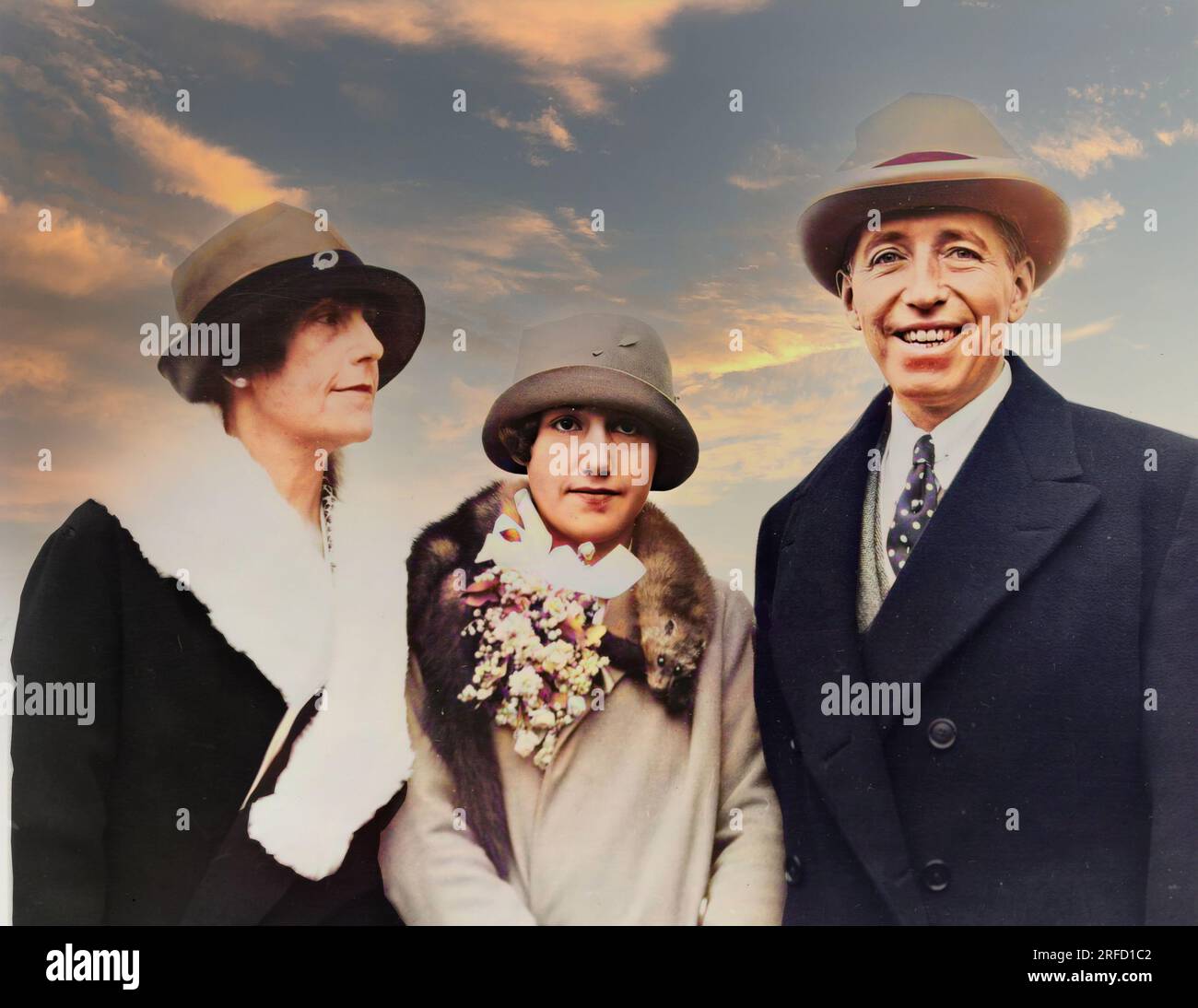 This is a colourised image of Pierre Camille Cartier (1878-1964), the famous French jeweller, his wife Elma and daughter Marion. In 1909 he opened his New York Store on Fifth Avenue. Among its famous customers were  have included Rockefellers, Fords and Astors and Mrs. John F. Kennedy, the Duchess of Windsor and Princess Grace of Monaco; Stock Photo