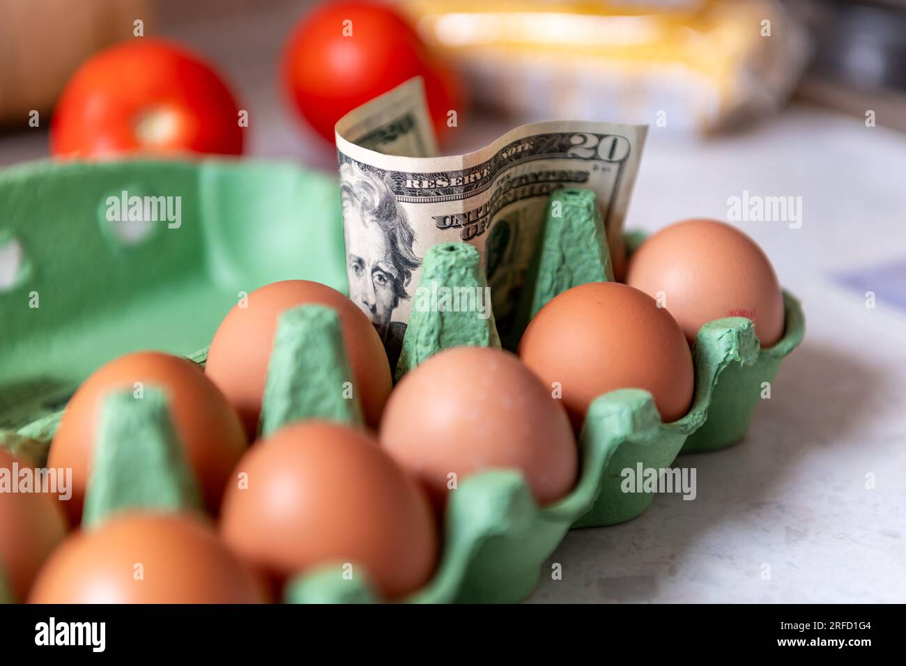 A cost of living, food inflation concept with US Dollar bills and grocery items Stock Photo Alamy