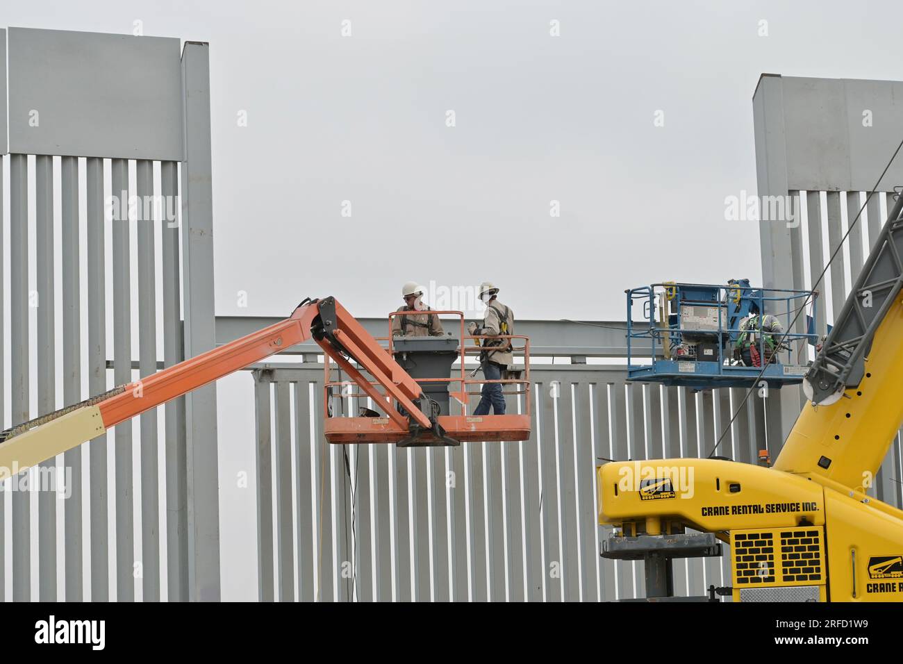 Tijuana, Mexico. 02nd Aug, 2023. Workers construct a new stretch of