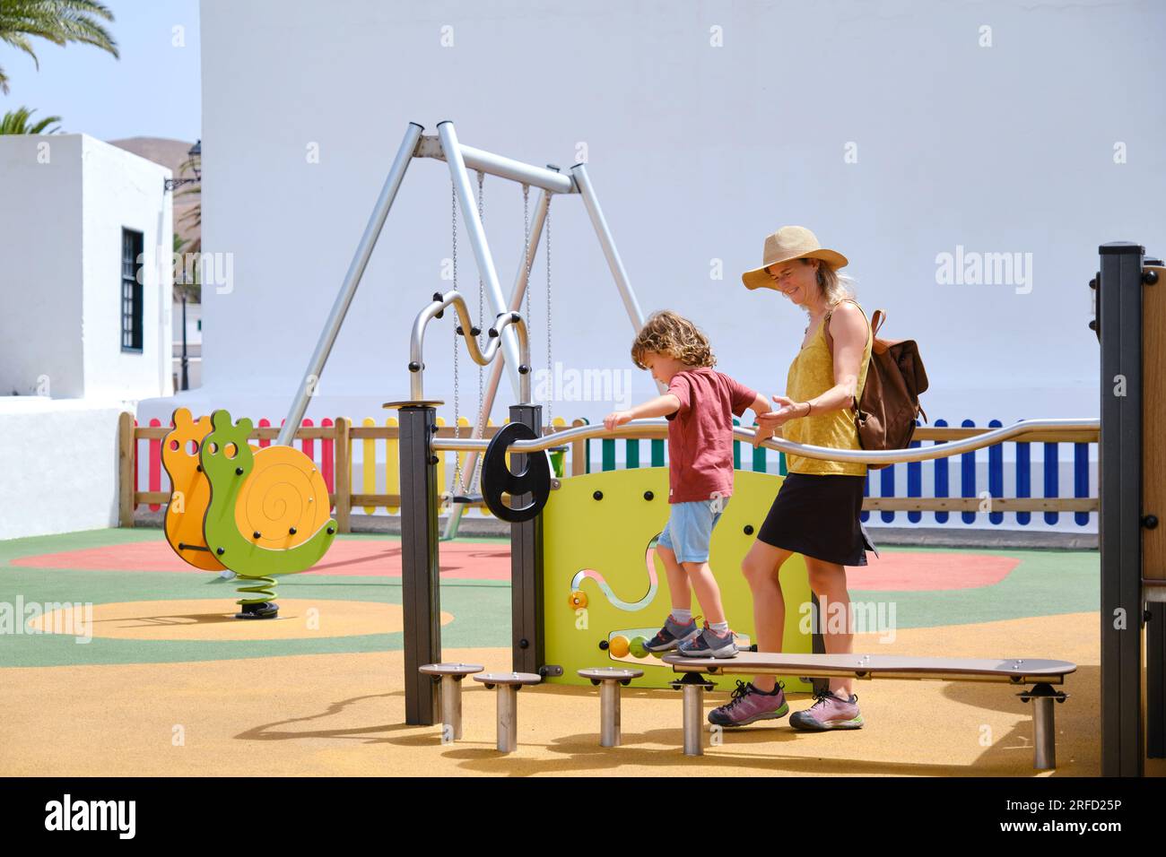 Mother and son playing on playground Stock Photo - Alamy