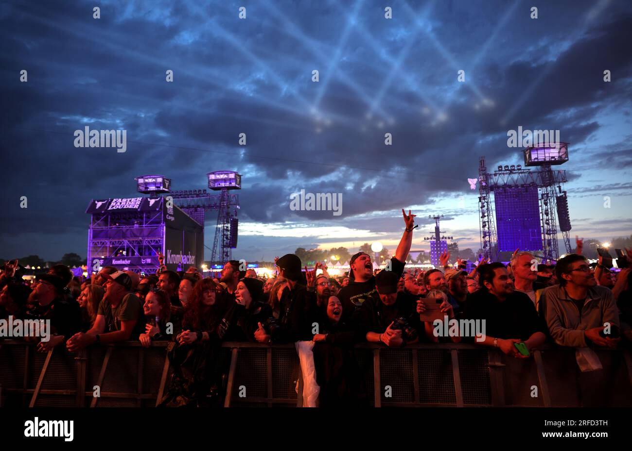 Wacken, Germany. 02nd Aug, 2023. Metal fans celebrate during a concert by  metal queen Doro Pesch at the Wacken Open-Air in front of the "Faster  Stage" stage, one of the two main