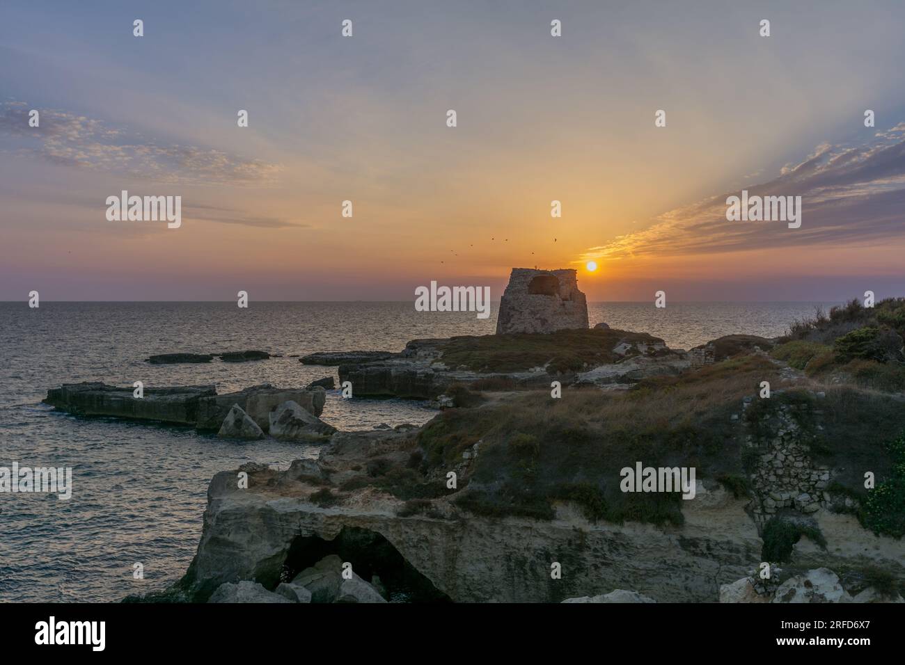 beautiful sunrise at la torre dell'orso, Puglia, Italy Stock Photo
