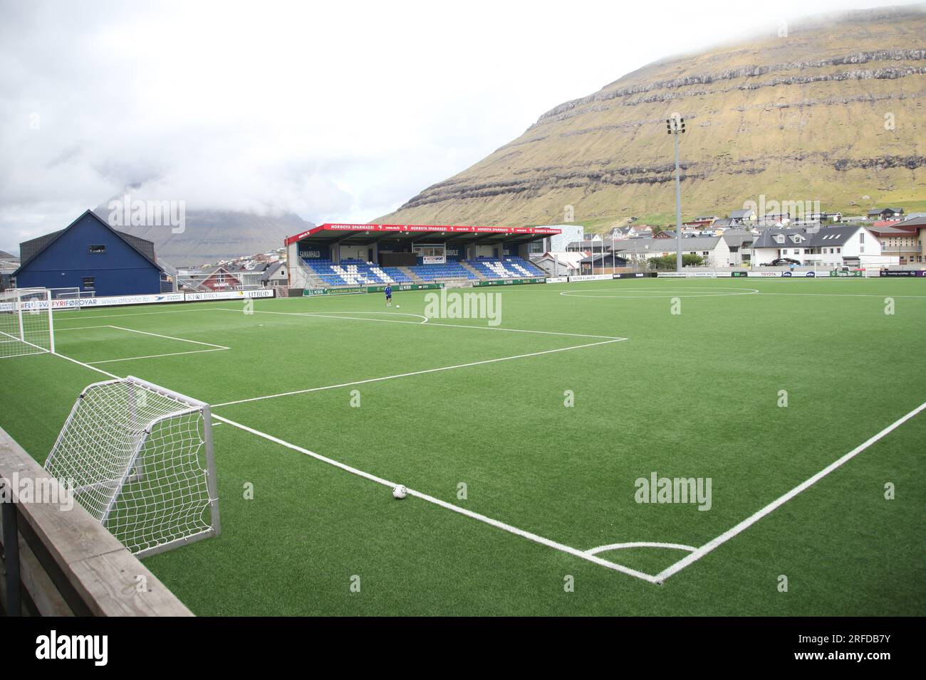 05 June 2021, Faroe Islands, Klaksvík: A person plays soccer in Djupumyra stadium. KÍ Klaksvik made Faroese soccer history on Wednesday night. The Faroe Islands champions advanced to the 3rd qualifying round of the Champions League by beating Swedish champions BK Häcken 4-3 in a penalty shootout and are now assured of at least a place in the group stage of the Conference League. This is the first time a Faroese team has participated in the group stage of a major European club competition. In addition, KÍ Klaksvik is the first men's team in the final round of the European Cup in 30 years. Photo Stock Photo