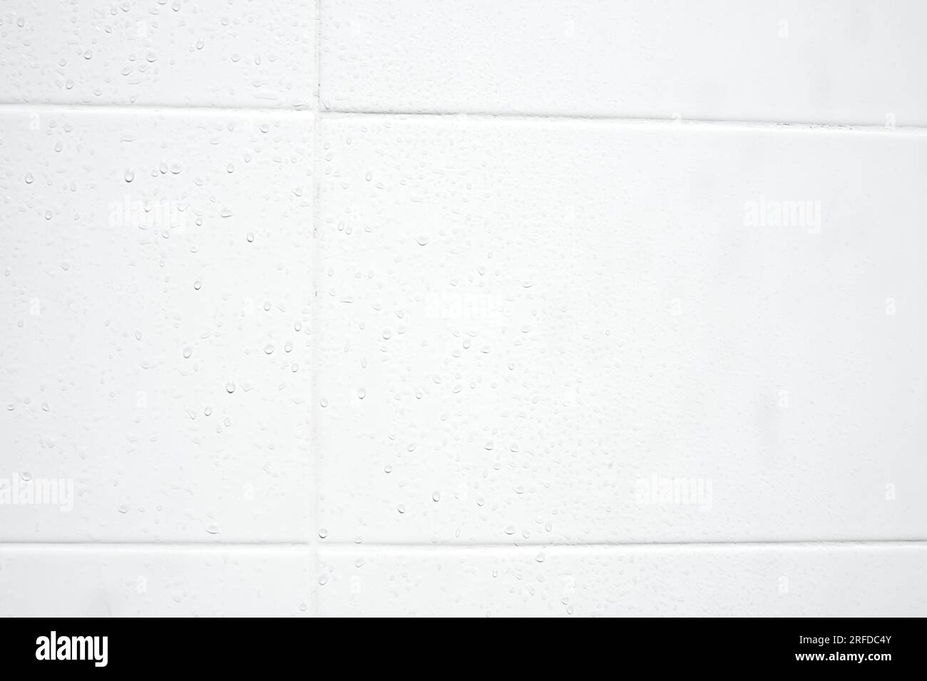 drop of water on white tiles wall texture background Stock Photo - Alamy