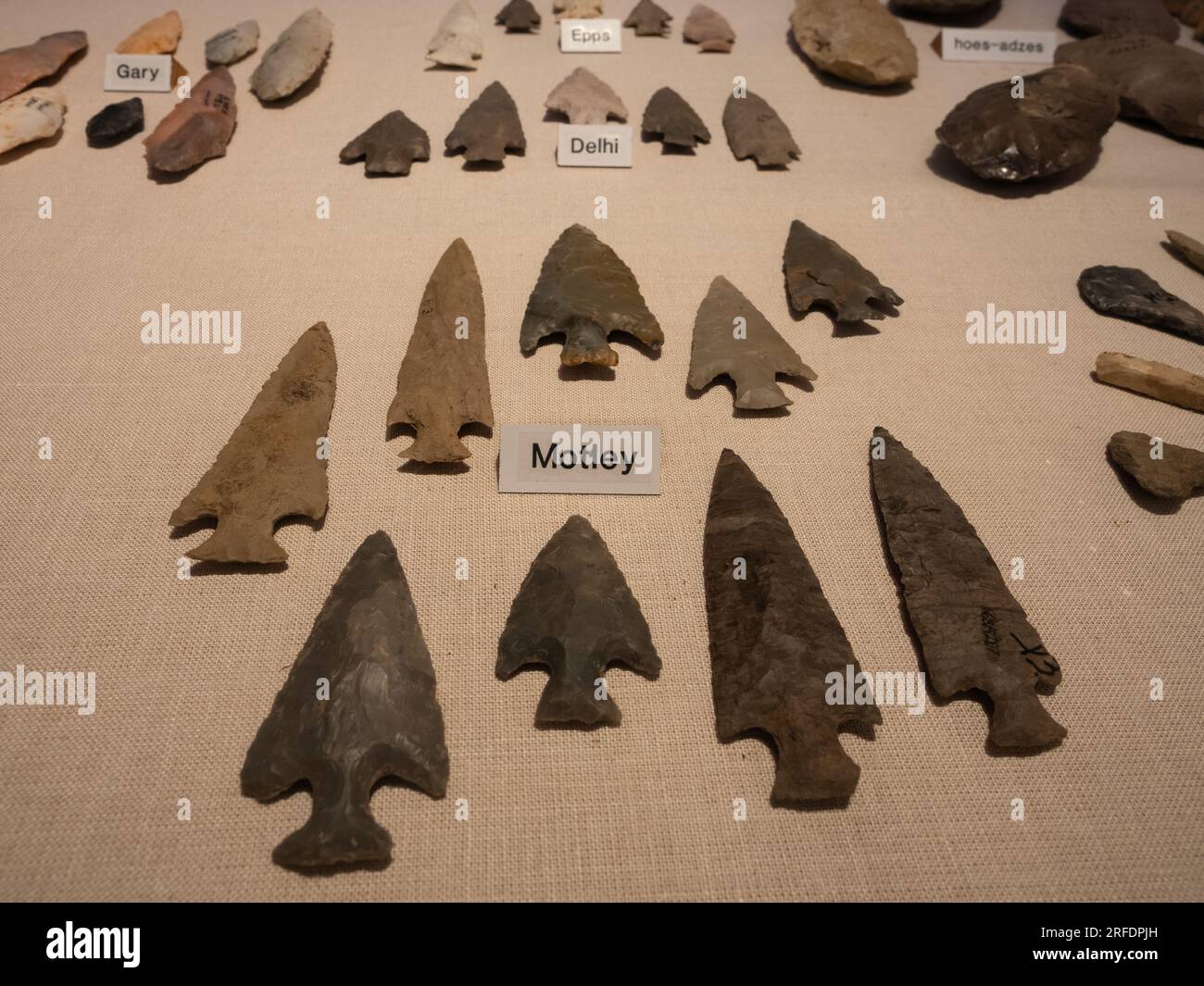 Collection of prehistoric arrowheads and stone implements excavated at Poverty Point National Monument and on display in the site's museum in West Car Stock Photo