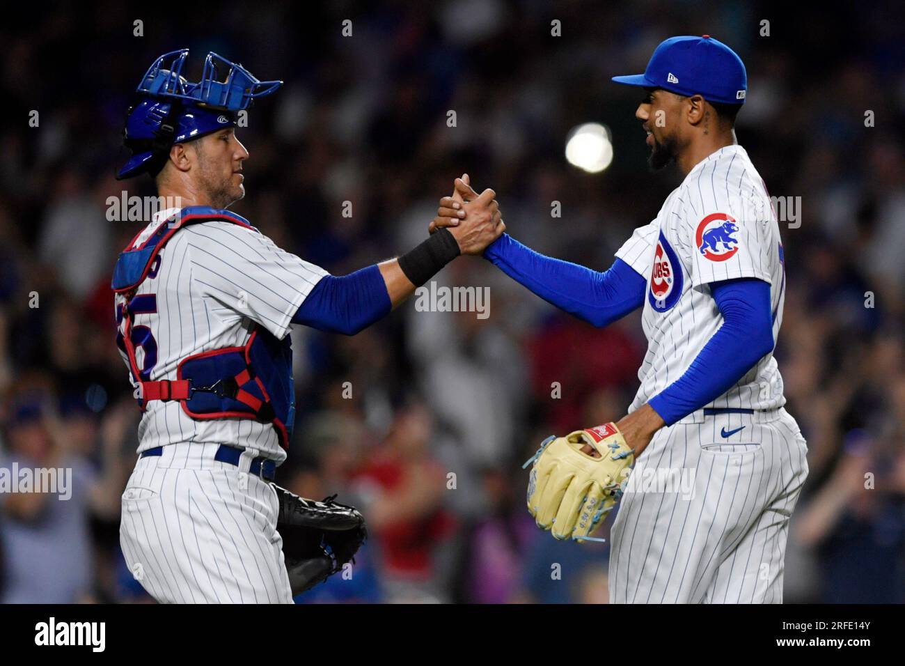 Chicago Cubs closing pitcher Jose Cuas, right, celebrates with catcher Yan  Gomes left, after defeating the Cincinnati Reds 16-6 in a baseball game  Wednesday, Aug. 2, 2023, in Chicago. (AP Photo/Paul Beaty