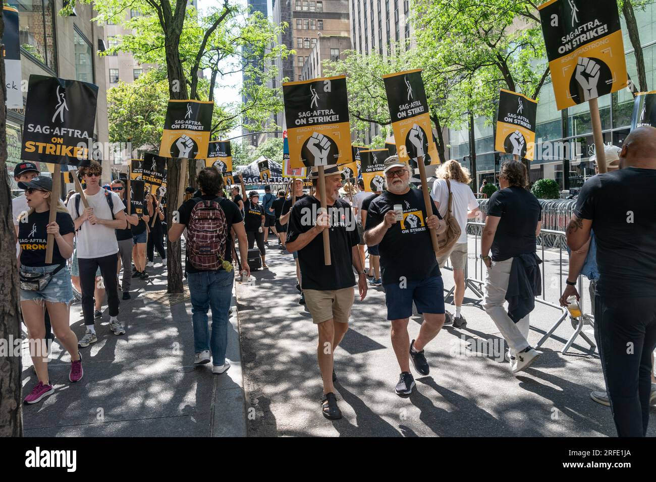 Strike workers of WGA and SAGAFTRA continue picket line in front of NBCUniversal headquarters