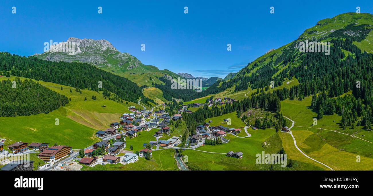 The glamorous mountain resort of Lech am Arlberg in summertime, aerial view to Lech and Oberlech Stock Photo