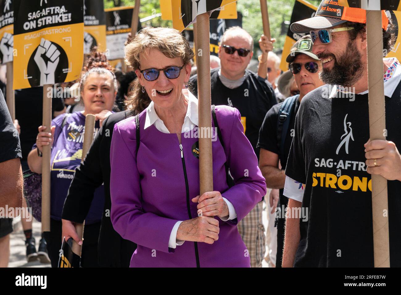 New York, New York, USA. 2nd Aug, 2023. International President of the Service Employees International Union Mary Kay Henry and Adam Sandler joined picket line of strike workers of WGA and SAG-AFTRA in front of NBCUniversal headquarters in New York. Senator Kirsten Gillibrand, Congressman Jerry Nadler, Public Advocate Jumaane Williams joined and spoke on the picket line. (Credit Image: © Lev Radin/Pacific Press via ZUMA Press Wire) EDITORIAL USAGE ONLY! Not for Commercial USAGE! Stock Photo