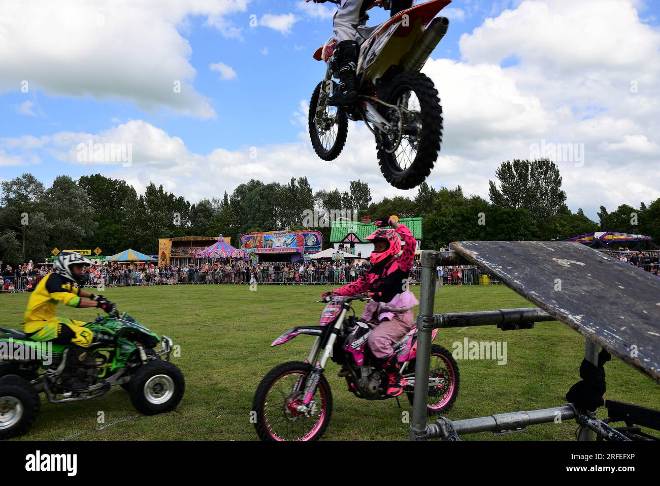 Trio of riders from Stunt Mania perform at 2017 Banbury & District Show in Spiceball Park, Banbury, UK Stock Photo