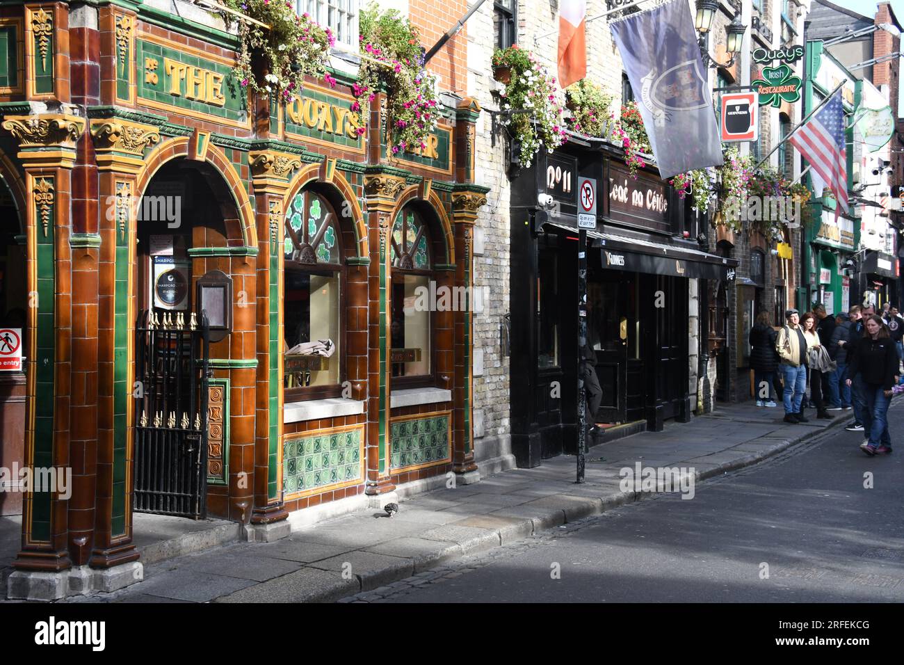 View of a street full of traditional irish pubs in Temple Bar district in Dublin, Ireland Stock