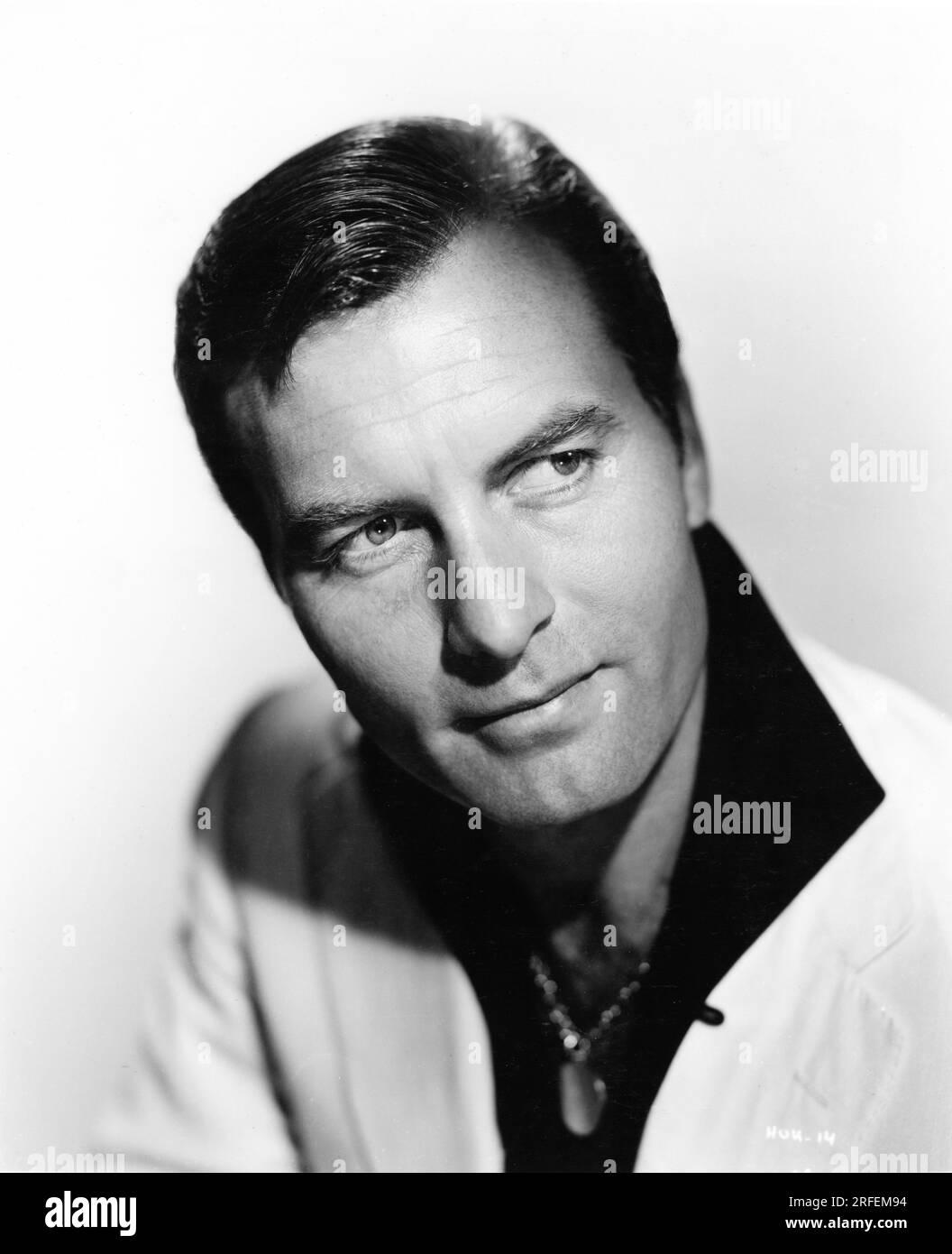 GEORGE MONTGOMERY Portrait publicity for HUK ! 1956 director JOHN BARNWELL novel /screenplay Stirling Silliphant music Albert Glassner Pan Pacific Productions / United Artists Stock Photo