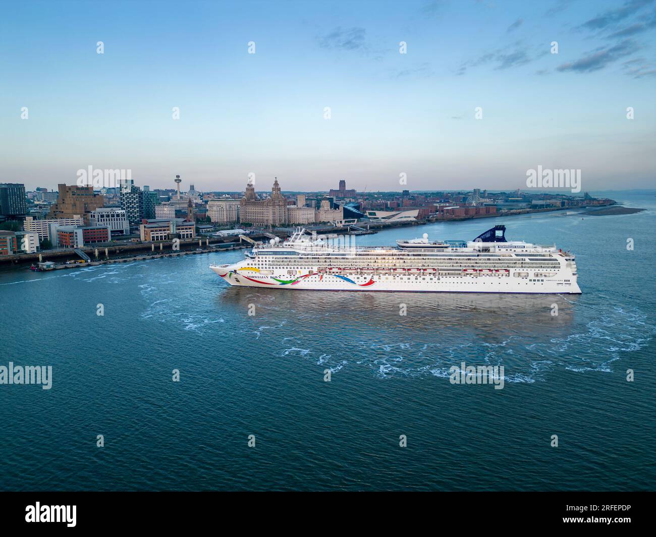 Norwegian Dawn cruise ship departs Pier Head, Liverpool, England Stock Photo