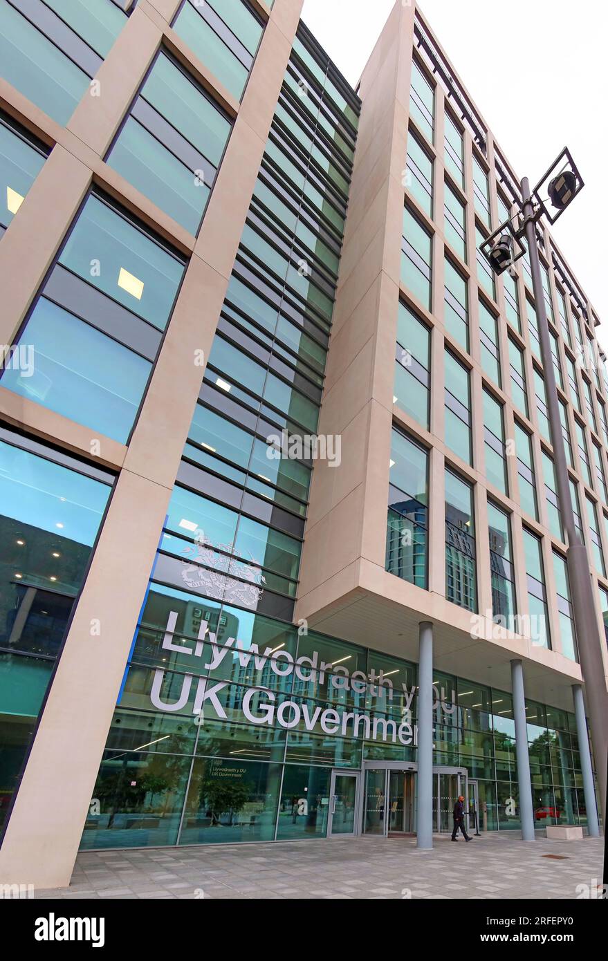 UK Government office building in Cardiff city centre, displaying bilingual Welsh and English signage, Cardiff, Wales, UK Stock Photo