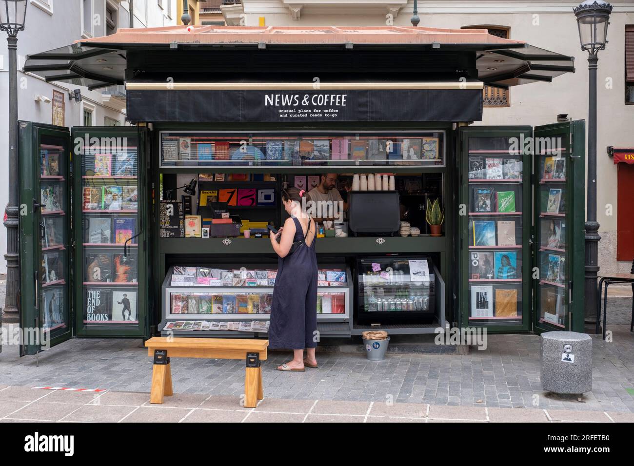Spain, Valencia, barrio del Carmen, newsstand and cafe Stock Photo