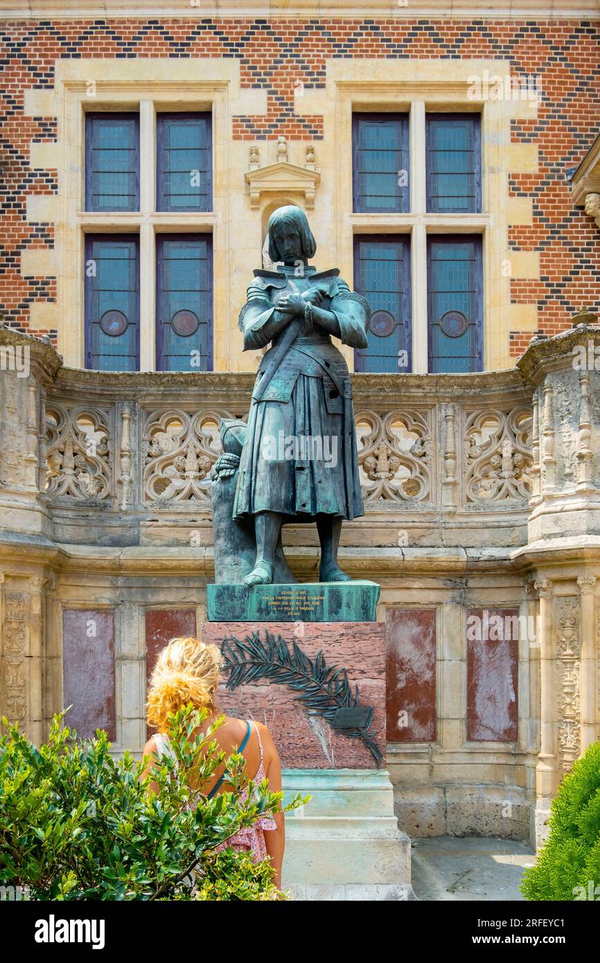 France, Loiret, Loire Valley listed as World Heritage by UNESCO, Orleans, hotel Groslot is a 16th century mansion in Renaissance style and designed by the French architect Jacques I Androuet du Cerceau, statue of Joan of Arc Stock Photo