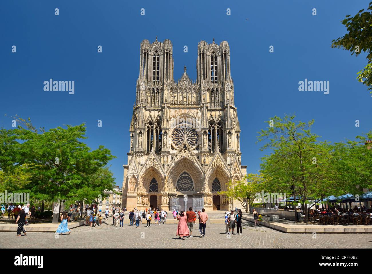 France, Marne, Reims, Notre Dame cathedral, Notre Dame Cathedral, listed as World Heritage by UNESCO, facade and pedestrian plaza Stock Photo