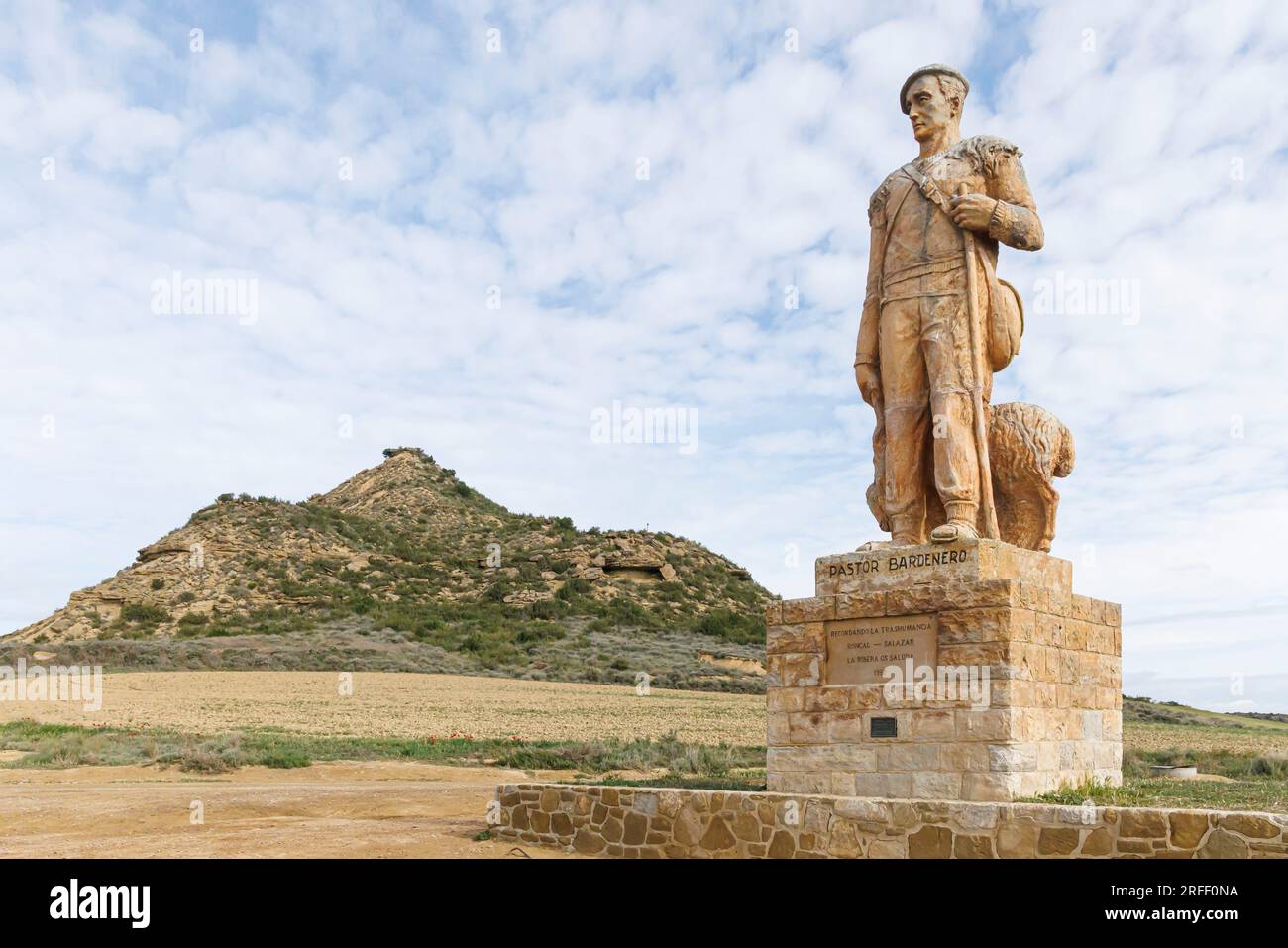 Spain, Navarra, Arguedas, The Bardenas Reales Biosphere Reserve and natural park listed as World Heritage by UNESCO, Bardena Blanca, a sheepherd statue Stock Photo