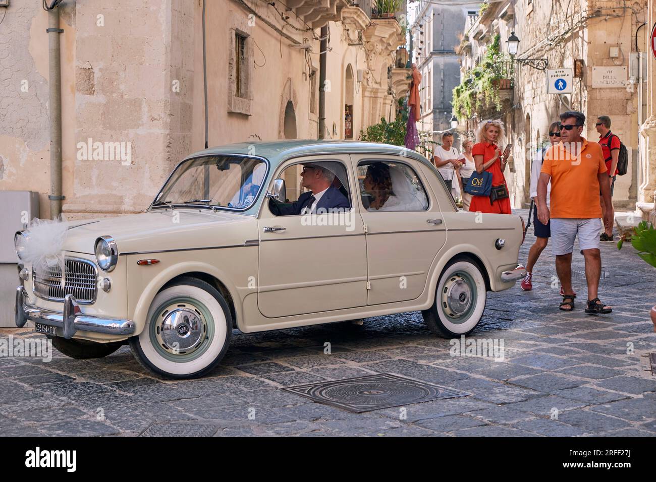 Italy, Sicily, Syracuse, Ortigia island, UNESCO World Heritage site, Alfa Romeo Giulietta wedding car (Sedan from 1965) Stock Photo