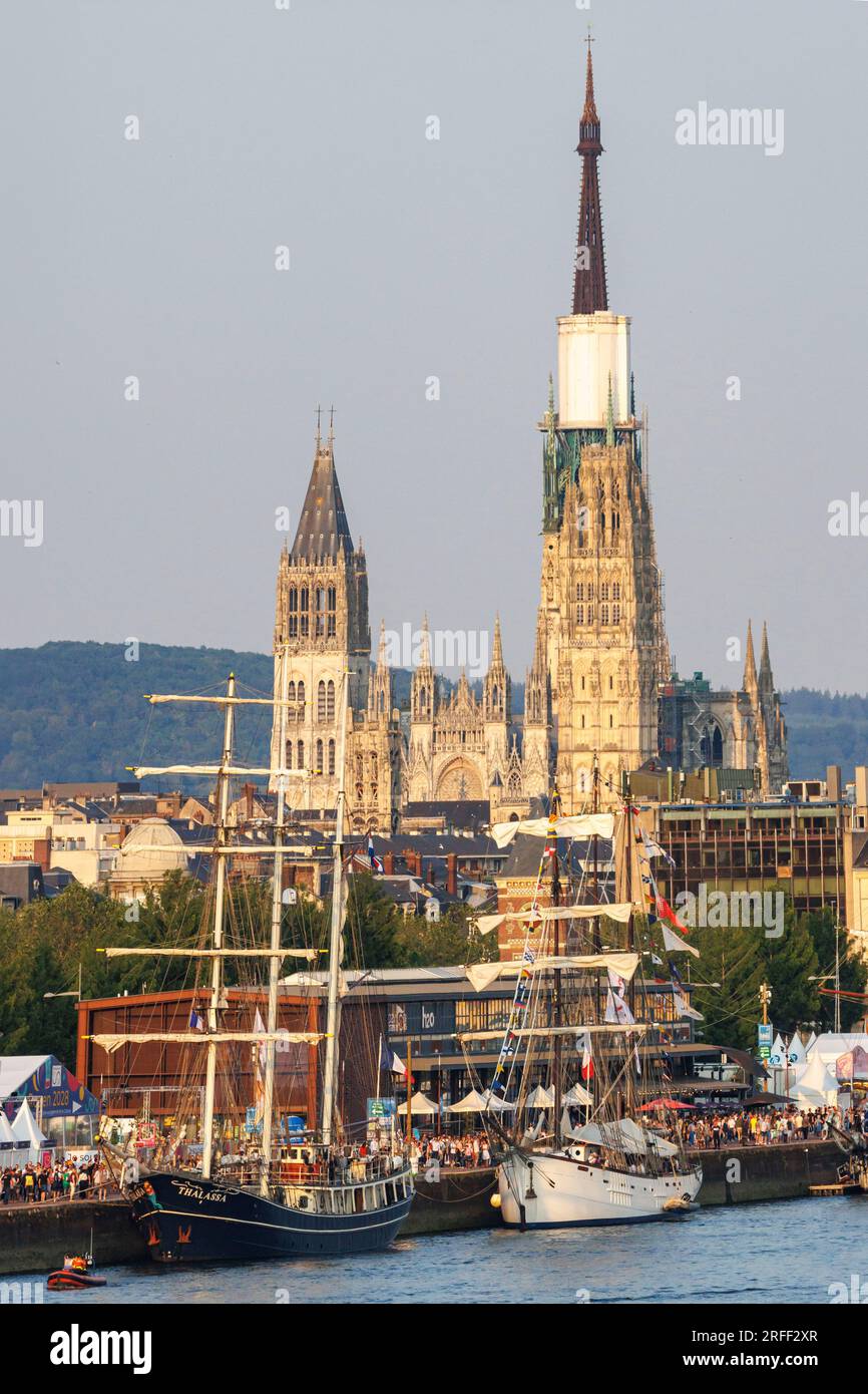 France, Seine-Maritime, Rouen, Armada 2023, tall ships docked at quay and crowd of tourists visiting the event, Notre-Dame cathedral in the background, elevated view from Gustave Flaubert Bridge Stock Photo