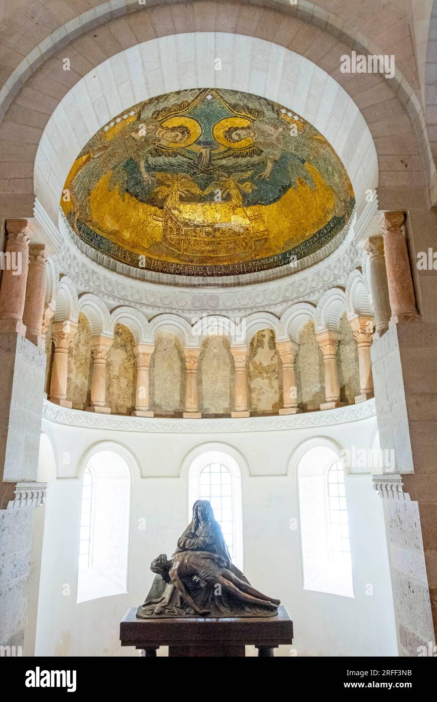 France, Loiret, Loire Valley listed as World Heritage by UNESCO, Germigny des Pres, Carolingian oratory or Church of the Most Holy Trinity, Pieta in oak from the Burgundian school (16th century) and only Byzantine mosaic (9th century) in France with two angels surrounding the Ark of the Covenant Stock Photo