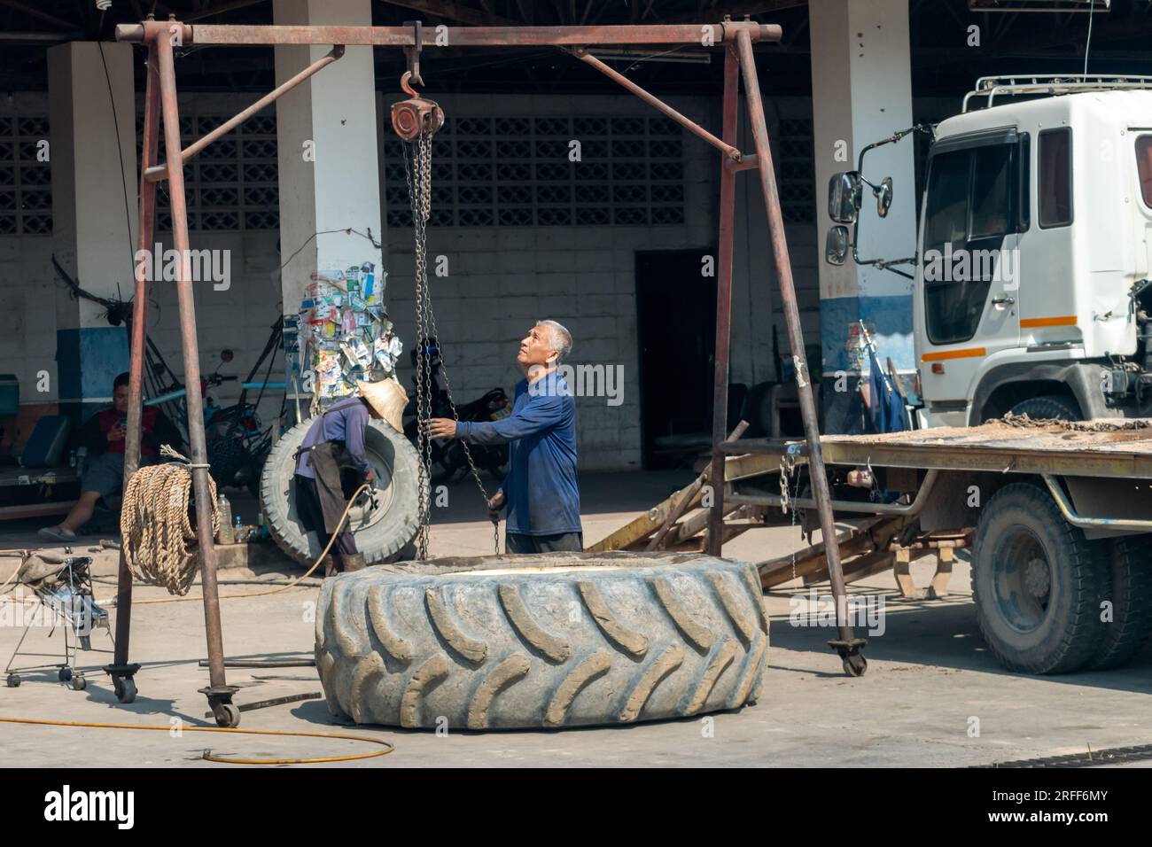 THAILAND, FEB 26 2023, The man works in a tire service Stock Photo