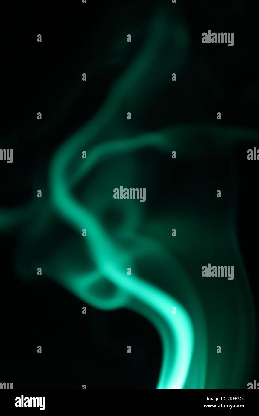 White smoke on a dark background, patterns, White fog abstract, vertical Stock Photo