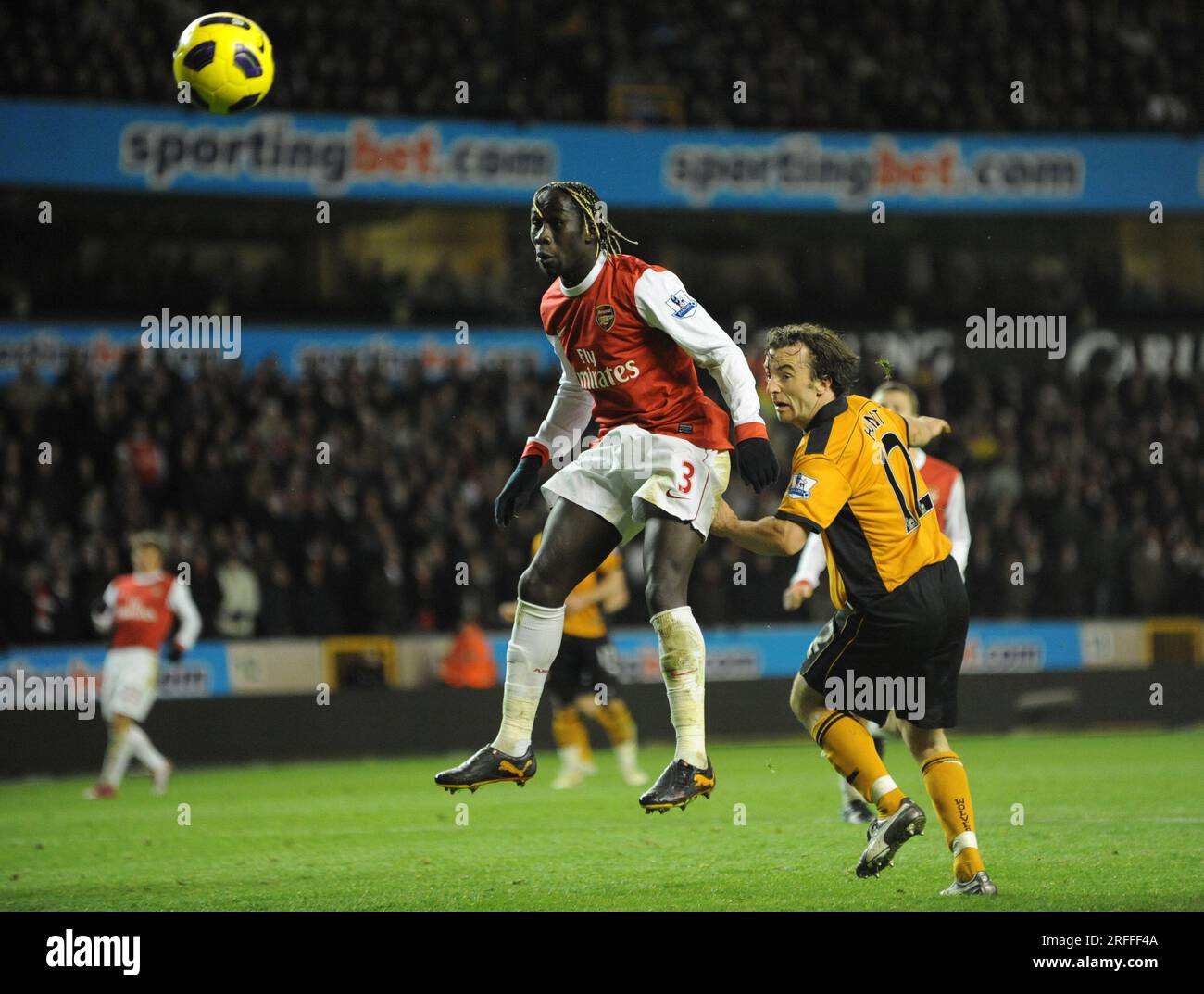 Bacary Sagna of Arsenal and Stephen Hunt of Wolverhampton Wanderers  Barclays Premier League - Wolverhampton Wanderers v Arsenal 10/11/2010 Stock Photo